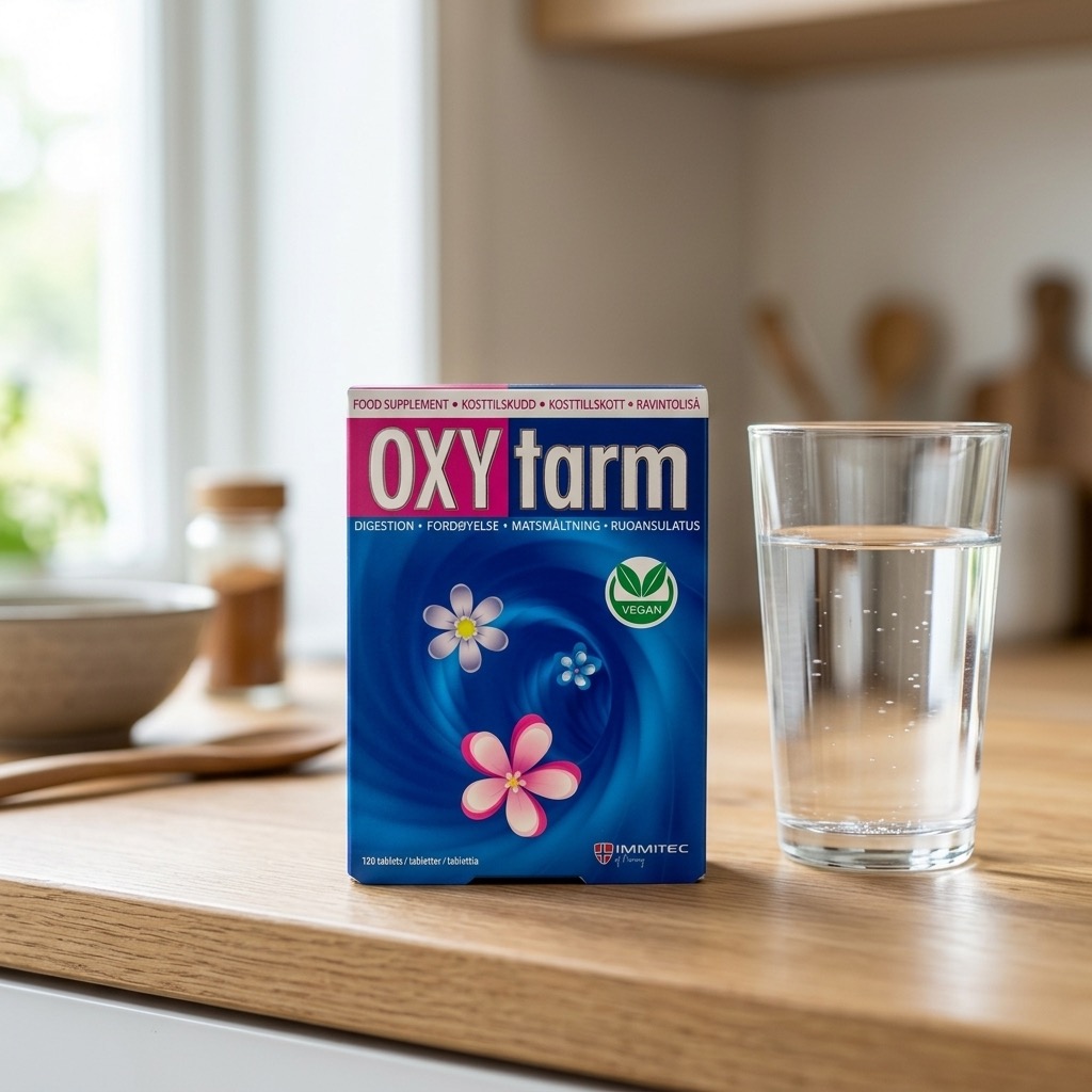 OXYtarm produkteske ved siden av et glass vann